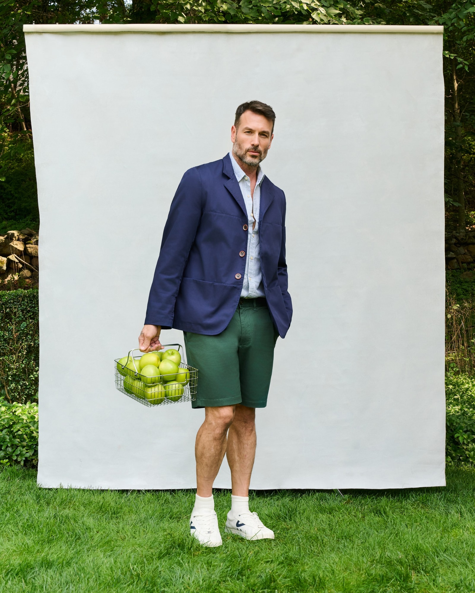 Male model wearing the navy Farnsworth Chore Coat, front view.